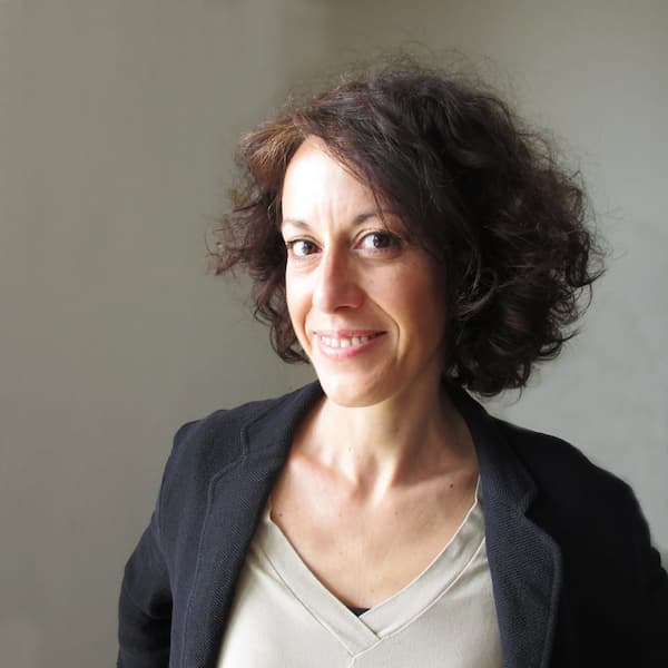 a woman smiling at the camera